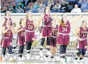  ?? BRYAN TERRY, THE OKLAHOMAN] [PHOTO BY ?? Cahion celebrates its win against Howe on Friday.