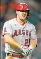  ?? Associated Press ?? David J. Phillip ANGELS’ Mike Trout reacts after being hit by a pitch by Cristian Javier.