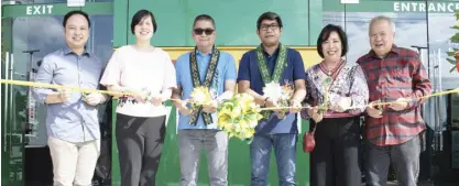  ?? ?? Wilcon Depot celebrates a milestone with the grand opening of its 1st Do It Wilcon Store in Morong, Rizal – marking the 6th branch in the province, bringing quality home solutions closer to its valued customers. Leading the ceremonial ribbon cutting are (L-R) Wilcon Depot AVP for Sales and Operations Rowell Suarez, President and CEO Lorraine Belo-Cincochan, Morong Rizal Honorable Vice Mayor Jose Fred Feliciano, Honorable Mayor Sidney B. Soriano, Wilcon Depot SEVP-COO Rosemarie Bosch-Ong and Ramonchito Kung.*