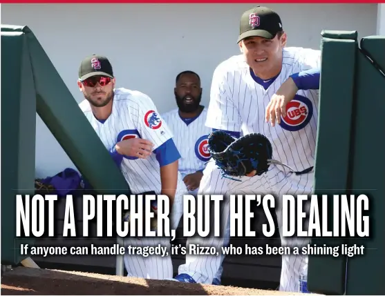  ??  ?? First baseman Anthony Rizzo, wearing a Stoneman Douglas High School cap, prepares to take the field Saturday in the Cubs’ spring home opener. | JOHN ANTONOFF/ FOR THE SUN- TIMES