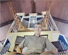  ?? DAVID BEBEE WATERLOO REGION RECORD ?? Jan Overduin sits on the bench of the First United Church organ, which he considers “an old friend.” Now recovered from a stroke suffered in March, the organist will perform a concert at the church on Sunday.