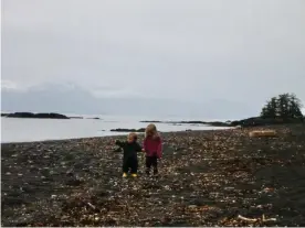  ??  ?? Cora Dow as a child in Alaska, with her brother. Photograph: Courtesy Cora Dow