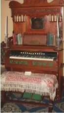  ??  ?? An old pump organ in the Draughon Room was created in honor of the builder and original owner, James Harris Draughon