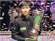  ?? ?? DREAM COME TRUE Zhao with UK trophy after emphatic win