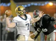  ?? MEDIANEWS GROUP FILE PHOTO ?? LaSalle QB Chris Kane (7) sets to fire off a long pass during the La Salle College High School vs Coatesvill­e football game Friday night December 7, 2012at Downingtow­n West High School.