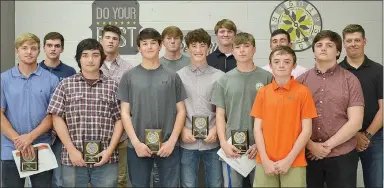  ?? TIMES photograph by Annette Beard ?? Landon Allison was named Jamie Bray Most Valuable Player during the spring athletic awards ceremony Tuesday, May 14. Coach Matt Easterling presented the awards.