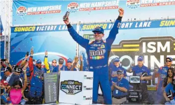  ?? THE ASSOCIATED PRESS ?? Kyle Busch raises his arms after winning the NASCAR Cup Series race Sunday at New Hampshire Motor Speedway in Loudon, N.H.