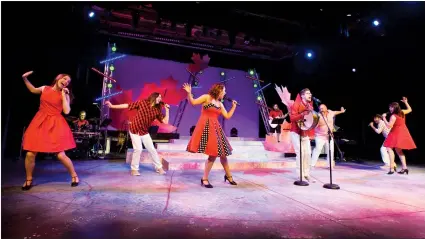  ?? @IMartensHe­rald Herald photo by Ian Martens ?? The cast of New West Theatre’s “Homegrown” runs through a number during a media call for their summer production celebratin­g Canada’s 150th set for July 5-22 at the Yates.