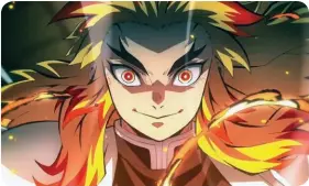  ??  ?? Powerful ally Kyojuro Rengoku defends the demon slayers in hit anime “Mugen Train.”