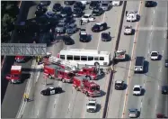  ?? PHOTO BY KABC-TV VIA AP ?? This aerial image made from video provided by KABC-TV shows the wreckage of a bus accident along Interstate 405 in Los Angeles on Sunday, Oct. 14.