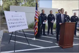  ?? AMY TAXIN — THE ASSOCIATED PRESS ?? Brian Gilhooly, FBI special agent in charge, speaks about a sweeping racketeeri­ng case against the Mexican Mafia during a news conference in Orange on Wednesday.