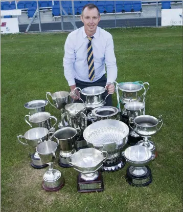  ??  ?? Martin Fitzgerald with a mountain of silverware.