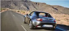  ?? Foto: Mazda ?? Von hinten sieht er fast ein bisschen wie ein Porsche Targa aus: Mazda hat seinem MX 5 RF ein elektrisch versenkbar­es Klappdach spendiert.