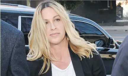  ?? THE ASSOCIATED PRESS/FILES ?? Singer Alanis Morissette arrives at court for the sentencing in the embezzleme­nt case of her former manager Jonathan Todd Schwartz earlier this week. Schwartz pleaded guilty after admitting he embezzled more than $7 million from the singer and other...