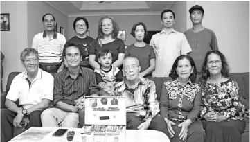 ??  ?? Dr Raja (seated 2nd left) and Ngalinuh (seated third right) with Ngalinuh’s family while Penghulu Freddie Apun is seated left.