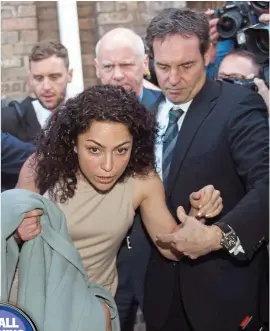  ?? PA ?? Centre of attention: Dr Eva Carneiro and her husband Jason De Carteret get in a taxi outside the tribunal