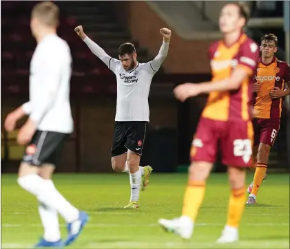  ?? ?? Aidan Keena, who played for Hearts, Queen’s Park, Dunfermlin­e and Falkirk, celebrates his goal at Fir Park