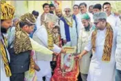  ?? PTI ?? Members of Tipu Sultan United Forum during an event to mark the birth anniversar­y of the former Mysore ruler in Bengaluru Friday.