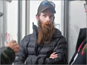  ?? SARAH GORDON/THE DAY ?? Marine veteran Steven Lesage talks with friends on Sunday during a fundraiser at Noble Jay Brewing in Niantic. Lesage will soon be embarking on an 18-month cross country hike to raise awareness about veteran suicide prevention and PTSD.