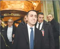  ?? AP PHOTO ?? Luigi Di Maio, the Italian 5-Star Movement’s leader, smiles as he leaves an hotel in Rome, Monday. With the anti-establishm­ent 5-Stars the highest vote-getter of any single party, the results confirmed the defeat of the two main political forces that...