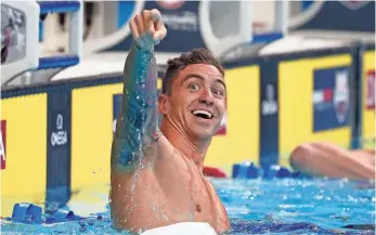  ?? ERICH SCHLEGEL, USA TODAY SPORTS ?? Anthony Ervin celebrates after placing second in the men’s 50-meter freestyle final in Omaha.