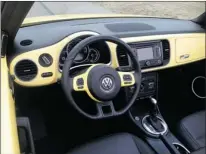  ?? ALEXANDRA STRAUB, SPECIAL TO THE GAZETTE ?? Optional features for the 2013 VW Beetle Convertibl­e include a Technology package with touch-screen navigation system, Sirius satellite radio and a Fender premium audio system.