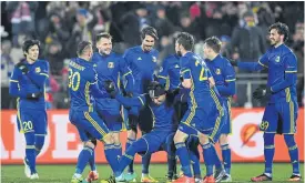  ??  ?? Rostov players celebrate scoring a goal against Bayern Munich last year.