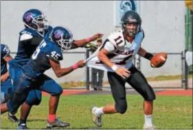  ?? SAM STEWART - DFM FILE ?? Boyertown’s Ayden Mathias (11) returns at QB for the Bears in 2018.