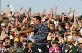  ?? CHARLIE RIEDEL - THE ASSOCIATED PRESS ?? Scottie Scheffler celebrates after winning the 86th Masters golf tournament on Sunday, April 10, 2022, in Augusta, Ga.