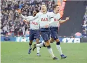  ?? PIC/PTI ?? Tottenham's Christian Eriksen (center) celebrates with Harry Winks after scoring a goal during the English Premier League football match between Tottenham Hotspur and Leicester City in London, Sunday