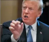  ?? EVAN VUCCI — THE ASSOCIATED PRESS ?? President Donald Trump speaks during a meeting with Republican lawmakers Tuesday in the Cabinet Room of the White House.