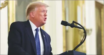  ?? Getty Images/tns ?? President Donald Trump speaks about “Operation Legend: Combating Violent Crime in American Cities” in the East Room of the White House in Washington, D.C., on Wednesday.