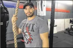  ?? JENNIFER BRETT / AJC ?? Clydesman Fitness owner Michael Chapa says Reality Winner worked out every day for a week when she was home in Texas during the holidays. The friendly businessma­n says he likes getting to know his clients, but he didn’t get far trying to chat with Winner.