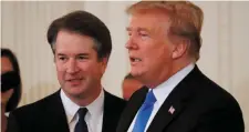  ??  ?? US President Donald Trump talks to his Supreme Court nominee Judge Brett Kavanaugh at the White House yesterday