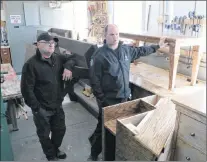  ?? GLEN WHIFFEN/THE TELEGRAM ?? Correction­al officers Andy Codner (left) and Steve Martin supervise and guide the inmates chosen to work in the carpenter shop. Pictured are some of the items being worked on in the shop, including picnic tables, an oak table, a dresser and a part of a...