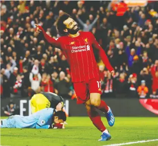  ?? PHIL NOBLE/REUTERS ?? Mohamed Salah and his Liverpool side appear to have the Premier League title locked up.