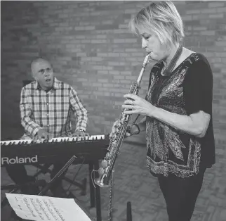  ?? DARREN BROWN ?? Juno-winning saxophonis­t/flutist, Jane Bunnett first met pianist Miguel De Armas when she invited him to dinner at her house. The pair ended up in an impromptu jam session into the wee hours of the morning.