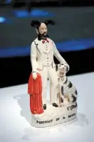  ?? — reuters ?? Cave produced a series of ceramic figurines that depict the life of the devil.