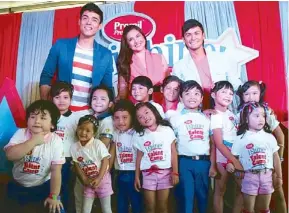  ??  ?? Dimples Romana (above, with co-hosts Xian Lim, left, and Matteo Guidicelli and the 12 kiddie finalists) takes a role close to her heart as host of Promil Pre-School i-Shine Talent Camp to premiere today at 9:30 a.m., on ABS-CBN.
— Photos by ALLAN SANCON