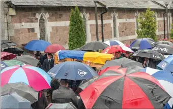  ??  ?? Draped in the Ballyhooly GAA colours, Philip Leahy’s coffin is carried to his final resting place at the grvaeyard in Ballyhooly. Philip was buried next to his father Philly who passed away suddenly in 2014.
Photo: John Delea.