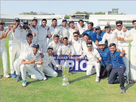  ?? UPCA ?? A jubilant Uttar Pradesh team pose with winners trophy in Nagpur on Thursday.