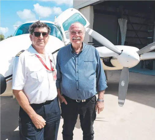  ?? ?? owner Greg Letondeur and Leichhardt MP Warren Entsch at the Daintree Air Services hangar at Cooktown Airport.