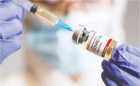  ?? DADO RuvIC/REUTERS ?? Nine months into the pandemic, says leading scientist Alan Bernstein, there is plenty to be optimistic about — starting with vaccine trial results from Pfizer and Moderna that have proven in testing to be up to 95-per-cent effective in preventing COVID-19.