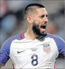  ?? AP PHOTO ?? United States’ Clint Dempsey reacts during a 2018 World Cup qualifying soccer match against Trinidad and Tobago in Couva, Trinidad on Tuesday.