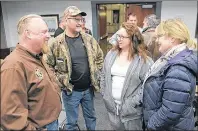  ?? GUARDIAN FILE PHOTO/MITCH MACDONALD ?? Dave Hanson, left, president of the P.E.I. Provincial Rifle Associatio­n, chats with Larry Sherren, Susan Mullen and Donna Myers following an informatio­n session in Stratford on proposed changes to Canadian firearms regulation­s.