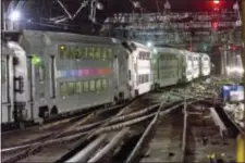  ?? AP PHOTO/RICHARD DREW ?? In this Tuesday, July 25, 2017 photo, a New Jersey Transit train traverses the tracks in New York’s Penn Station.