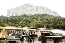  ??  ?? A general view of the Wonderland Villas hilltop residentia­l complex in the Kwai Fong district
of Hong Kong. (AFP)