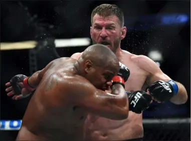  ?? HANS GUTKNECHT — SOUTH CALIFORNIA NEWS GROUP ?? Stipe Miocic defeated Daniel Cormier to win the UFC heavyweigh­t championsh­ip Aug. 17 in Anaheim, Calif., at UFC 241.