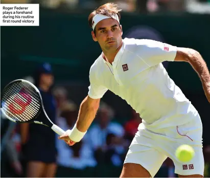  ??  ?? Roger Federer plays a forehand during his routine first round victory