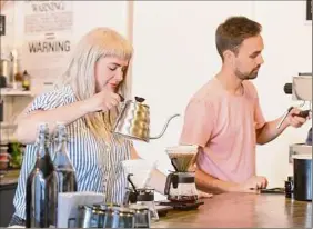  ?? Madison Iszler / Albany Times Union ?? Felicity Jones, left, and Mike Romig, right, owners of Superior Merchandis­e Co. in Troy, will close the brick-and-mortar shop in April.